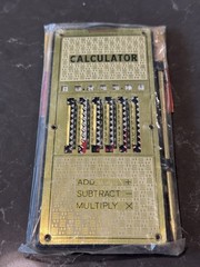 Vintage (c.1960) Magic Brain Pocket Calculator Metal Plastic W/pen (Sealed)