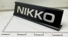 Nikko Logo Desk Sign – Custom Black & Silver Aluminum Reversible Insert