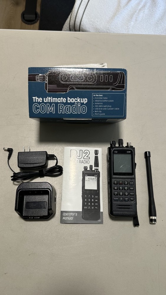 Sporty’s PJ2 Aviation Comm Radio with Rechargeable Battery & Charger Stand