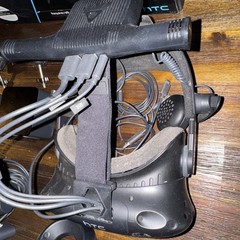 HTC Vive with controllers, deluxe headset strap, and wireless adapter