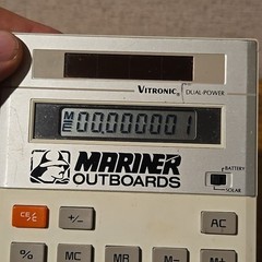 Vintage Vitronic Dual-Power Desk Calculator Mariner Outboards Advertisement