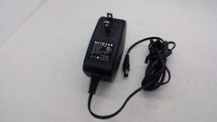 Netgear AC-DC Adapter AD817F10 332-10301-02 100-120V 50/60Hz .56A 12V 1.5A