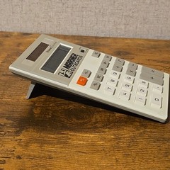 Vintage Vitronic Dual-Power Desk Calculator Mariner Outboards Advertisement