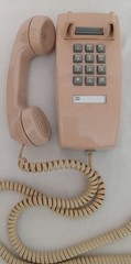 Western Electric rose beige 2554 touch tone wall phone, works
