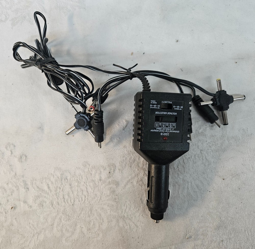 Universal Car Cord Travel Adapter 33018 3-12 Volts 500ma w Adapters