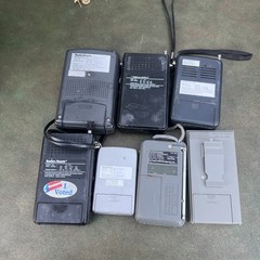Lot of 7 Mixed AM/FM Pocket Radios Several Models Portable Handheld Most Working