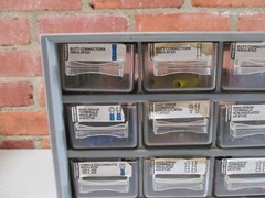 Lot of Small Vintage Electrical Connectors In Organizer Cabinet
