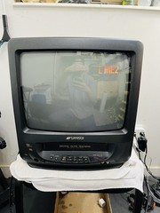 Samsul Box Tv- Model #Com3100. Work Greats, No Remote. Small Crack See Pictures!
