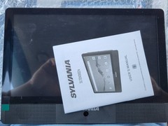 Sylvania 10.1″ Quad Core Tablet/Portable DVD Player Combo SLTDVD1024