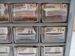 Lot of Small Vintage Electrical Connectors In Organizer Cabinet
