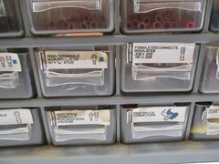 Lot of Small Vintage Electrical Connectors In Organizer Cabinet