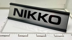 Nikko Logo Desk Sign – Custom Black & Silver Aluminum Reversible Insert