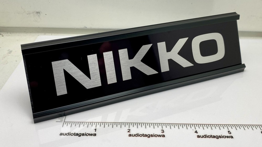 Nikko Logo Desk Sign – Custom Black & Silver Aluminum Reversible Insert