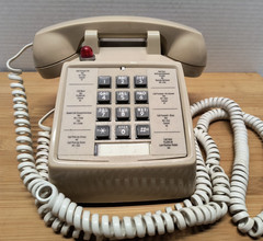 ITT Beige Cortelco 250044-VBA-27M Push Button Phone W/ 25Ft. White Coil Cord