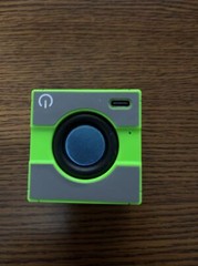 One Mini Portable Bluetooth Speaker in Black/Green Approx: 1.9″ X 1.5″ X 1.9″