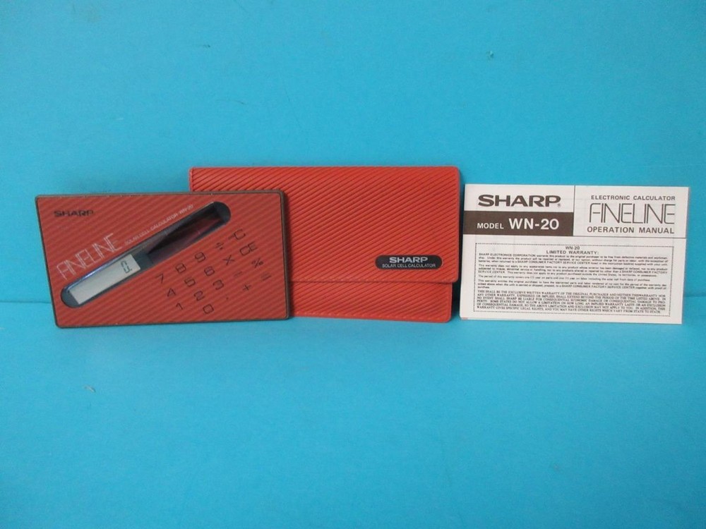 AWESOME VINTAGE SHARP FINELINE SOLAR CELL CALCULATOR WN-20 ORANGE W/ CASE RARE