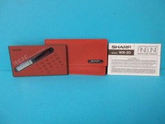 AWESOME VINTAGE SHARP FINELINE SOLAR CELL CALCULATOR WN-20 ORANGE W/ CASE RARE