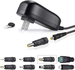 Safe & Reliable 24W Universal Adapter with 8 Changeable Plugs and Protection