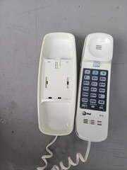 AT&T 210 Basic Trimline Corded Phone, No AC Power Required, Wall-Mountable