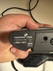 Bundle: TomTom One 3rd Edition 1 GB GPS 4N01.003 Navigator with cord and mount