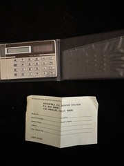 IBM calculator, with case, 3 inches X 2 inches. solar powered