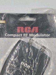 RCA Compact RF Modulator Allows DVD Player Or Gaming Consoles To Connect To TV