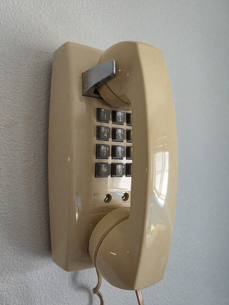 Vintage Western Electric 2554 Wall-Mounted Corded Line-Powered Analog Telephone