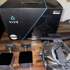 HTC Vive with controllers, deluxe headset strap, and wireless adapter