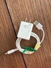 white AC-to-DC wall power adapter and USB-barrel connector cable.