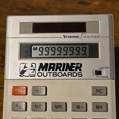 Vintage Vitronic Dual-Power Desk Calculator Mariner Outboards Advertisement