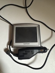 Bundle: TomTom One 3rd Edition 1 GB GPS 4N01.003 Navigator with cord and mount